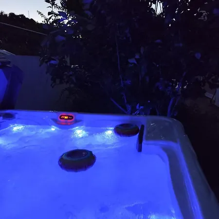 With Outdoor Jacuzzi